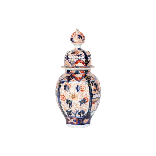 158 - A Japanese Imari vase and cover, Meiji period. Height 34cm, width 15cm.