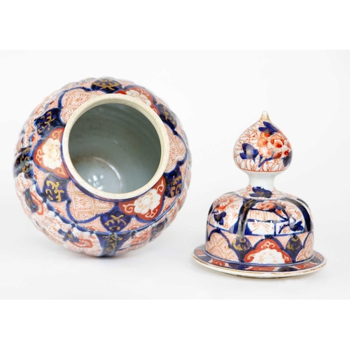 158 - A Japanese Imari vase and cover, Meiji period. Height 34cm, width 15cm.