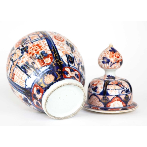 158 - A Japanese Imari vase and cover, Meiji period. Height 34cm, width 15cm.