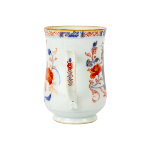 16 - A Chinese Imari porcelain mug, 18th century. Height 13.5cm. Fritting to the interior and pitting to ... 