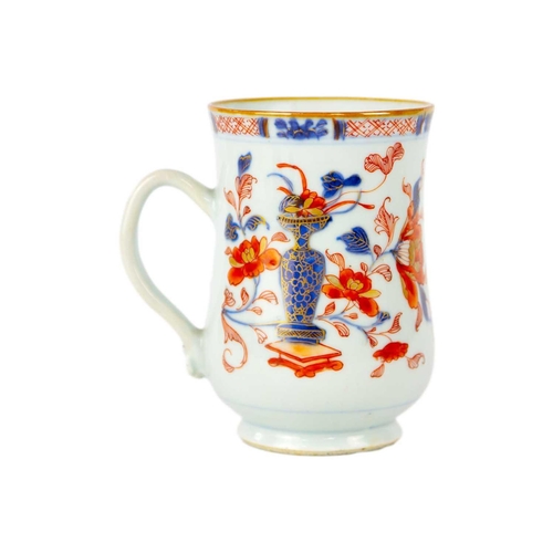 16 - A Chinese Imari porcelain mug, 18th century. Height 13.5cm. Fritting to the interior and pitting to ... 