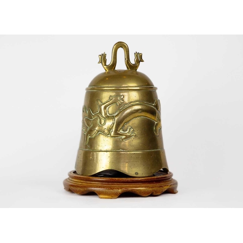 165 - A Chinese polished bronze bell, early 20th century. With a dragon chasing the flaming pearl, on a 20... 