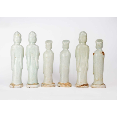 174 - Six Chinese celadon glazed pottery figures, probably Yuan Dynasty. Heights 26 and 22.5cm. (6)