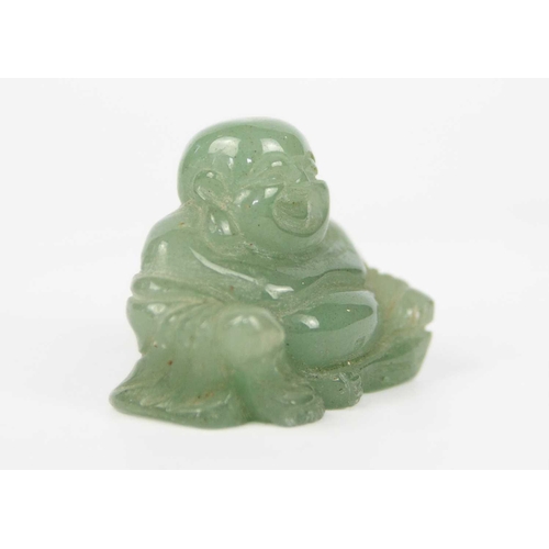 194 - A Chinese miniature jade model of Buddha Height 3.5cm, width 4.5cm, depth 2.4cm.