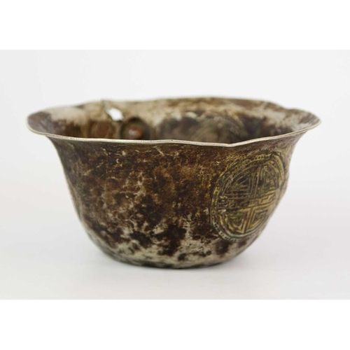 196 - A Chinese tinned metal bowl, Qing Dynasty. Decortated with shou symbols, height 8cm, diameter 16.5cm... 