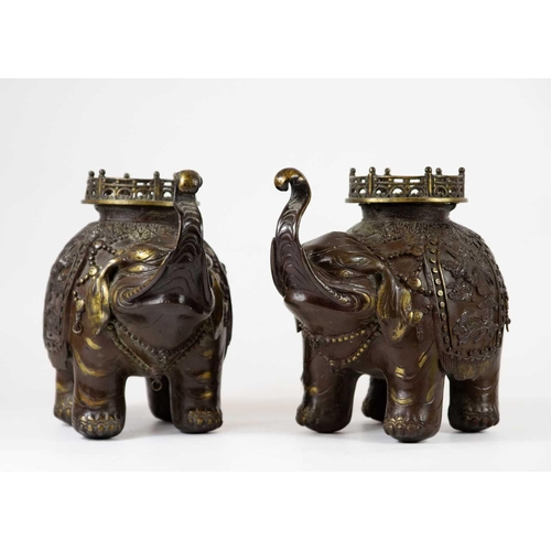 2 - A pair of Chinese bronze elephant incense burners. Early 20th century, height 21.5cm, width 24cm. (2... 