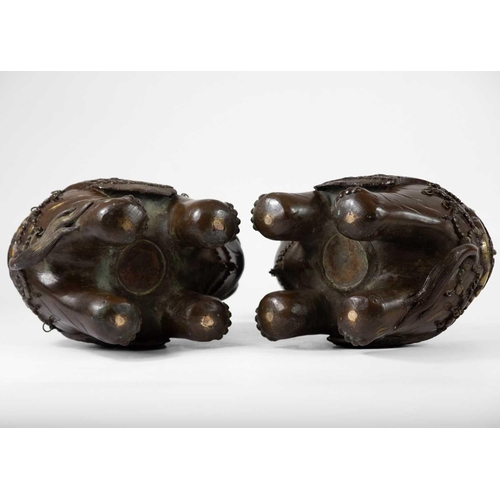 2 - A pair of Chinese bronze elephant incense burners. Early 20th century, height 21.5cm, width 24cm. (2... 