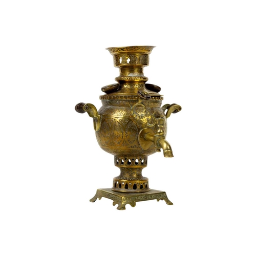 206 - A Persian brass samovar, circa 1900. Height 19cm, width 14cm, depth 13.5cm.