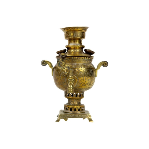 206 - A Persian brass samovar, circa 1900. Height 19cm, width 14cm, depth 13.5cm.