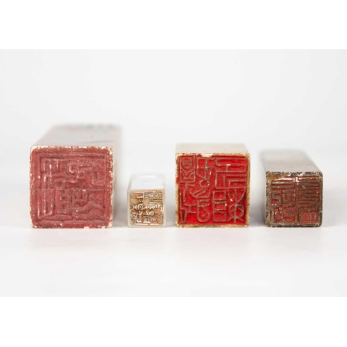 243 - Three Chinese soapstone seals, 19th century. Heights 10cm, 9cm and 4.5cm; and a Chinese rock crystal... 