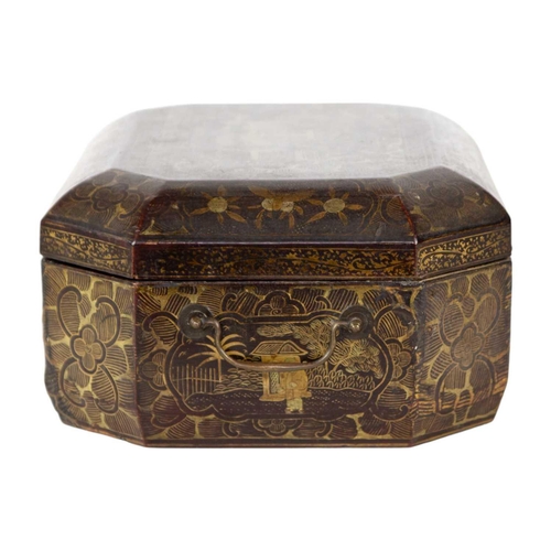 244 - A Chinese export lacquer work box, 19th century. The gilt decorated lid opening to reveal a lift-up ... 