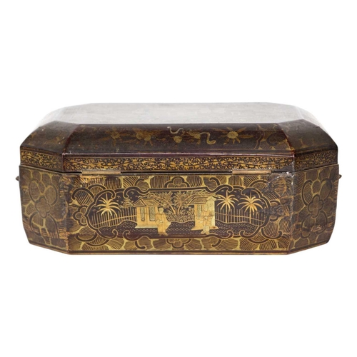 244 - A Chinese export lacquer work box, 19th century. The gilt decorated lid opening to reveal a lift-up ... 