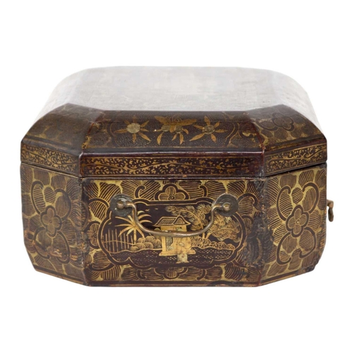 244 - A Chinese export lacquer work box, 19th century. The gilt decorated lid opening to reveal a lift-up ... 