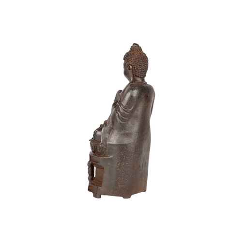 246 - A Chinese iron model of Buddha, 19th century. The Buddha seated on a plinth, inscriptions to rear, h... 