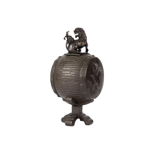 247 - A Japanese bronze koro, Meiji period. With associated cover, the body of barrel form and decorated i... 