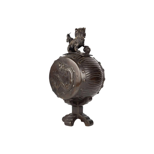 247 - A Japanese bronze koro, Meiji period. With associated cover, the body of barrel form and decorated i... 