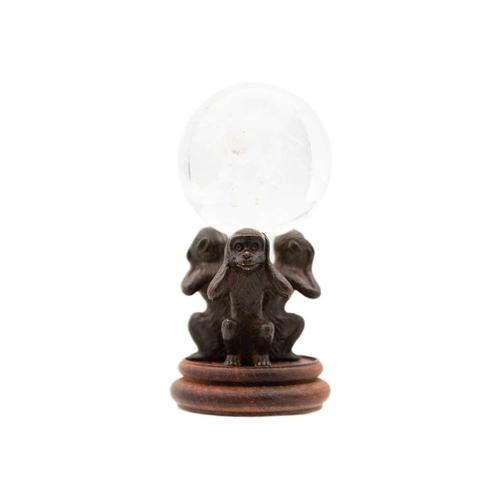 259 - A Japanese bronze of three wise monkeys, early 20th century. Holding a crystal ball, with a later wo... 