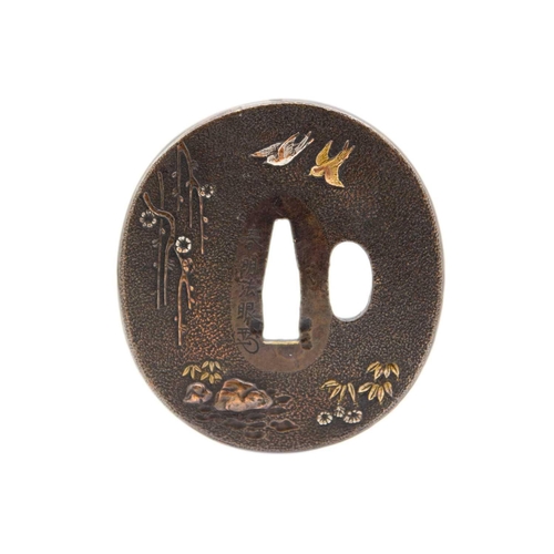 262 - A Japanese inlaid fuichi and kashira, Edo period. 3.8 x 2cm and 3.6 x 1.6cm; and a signed bronze tsu... 