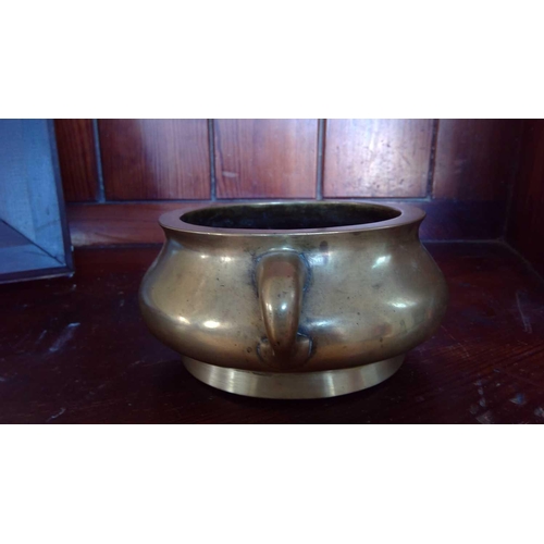 272 - A Chinese polished bronze censer, 18th/19th century. Seal mark to base, height 7.5cm, width 20cm, de... 