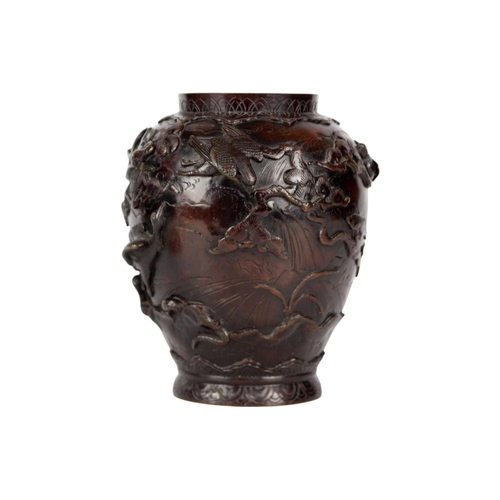 274 - A Japanese bronze vase, Meiji period. Decorated in high relief with birds, trees and foliage, seal m... 