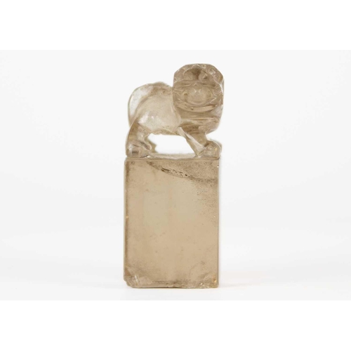 278 - A Chinese rock crystal seal, 19th century. Surmounted by a dog of fo, uncut, height 5.5cm, width 2.5... 