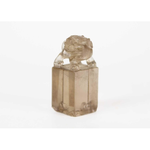 278 - A Chinese rock crystal seal, 19th century. Surmounted by a dog of fo, uncut, height 5.5cm, width 2.5... 