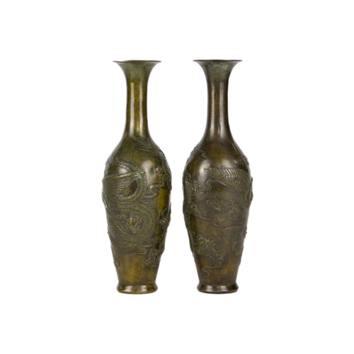 286 - A pair of Chinese bronzed vases, 20th century. Decorated in relief with dragons and cloud scrolls, s... 