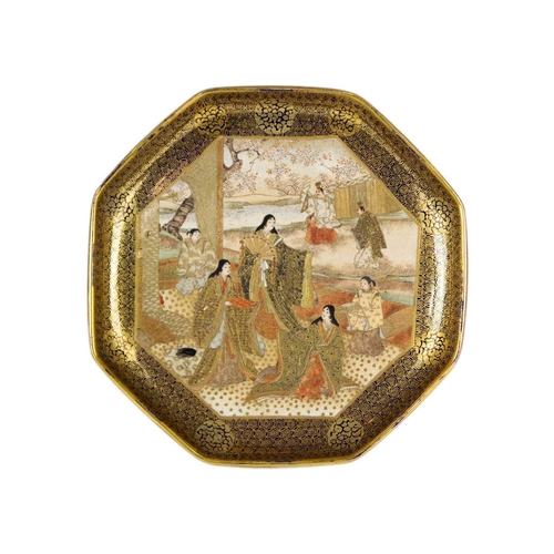 299 - A pair of Japanese Satsuma octagonal plates, Meiji period. Gilt decorated with multiple figures in a... 