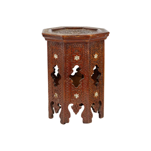 30 - A Syrian octagonal occasional table, late 19th century. Height 39cm, width 27cm, width 28cm.