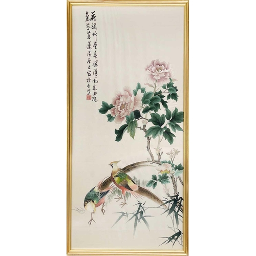 301 - A Chinese silk picture, early-mid 20th century. Depicting two pheasants and flowering branches, with... 