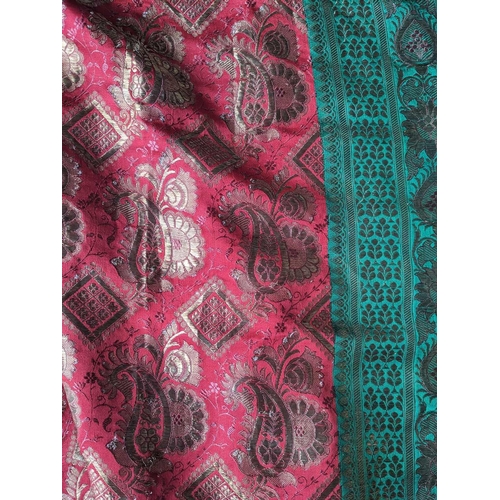 309 - An Indian silk paisley shawl, 20th century. The red ground decorated with a gold boteh design, withi... 