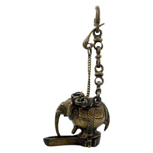 312 - An Indian bronze hanging lamp in the form of an elephant. Length including chain 26.5cm, width 9cm, ... 