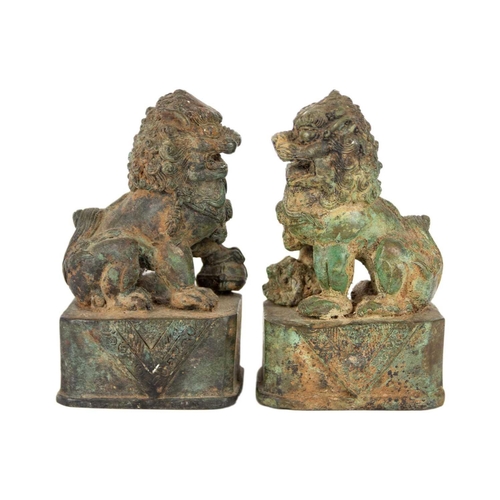 325 - A pair of Chinese metal on porcelain dogs of fo, early 20th century. Height 14cm, width 5.5cm, depth... 