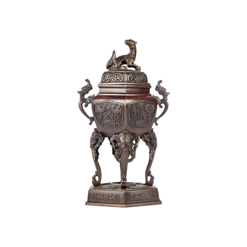 37 - A Japanese bronze koro, Meiji period. Height 32cm, width 14.5cm, depth 13cm and a Japanese porcelain... 