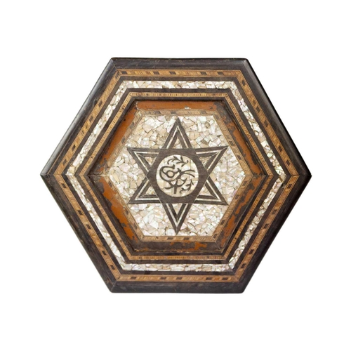 40 - A Syrian hexagonal occasional table, late 19th century. Inlaid with mother of pearl and parquetry, h... 