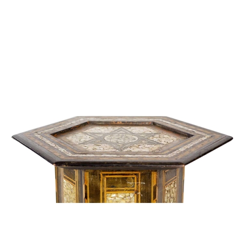 40 - A Syrian hexagonal occasional table, late 19th century. Inlaid with mother of pearl and parquetry, h... 