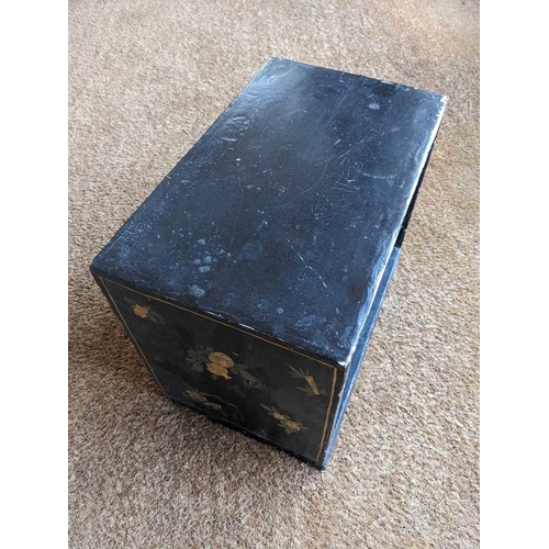 53 - A Japanese black lacquered table cabinet, 19th century. With an arrangement of six drawers, on brack... 