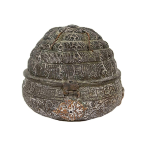 56 - A Burmese brass incense burner, 19th century. Height 11cm, width 11.5cm.