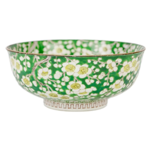 57 - A Japanese porcelain prunus pattern bowl, Meiji period. With a green ground, height 9cm, diameter 21... 