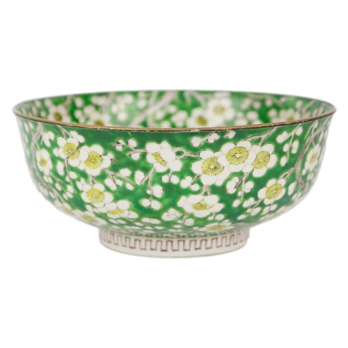 57 - A Japanese porcelain prunus pattern bowl, Meiji period. With a green ground, height 9cm, diameter 21... 