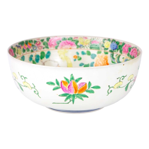 6 - A Samson pseudo Canton punch bowl, early 20th century. Height 14.5cm, diameter 34.5cm.