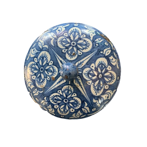 60 - A Moroccan blue and white pottery lidded khabia jar, 19th century. Height 44cm, width 27.5cm. chips ... 