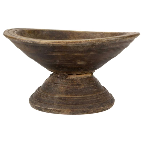 64 - A Middle Eastern treen comport, 19th century. Height 14.5cm, diameter 26cm.