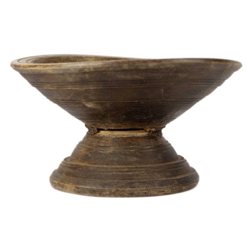 64 - A Middle Eastern treen comport, 19th century. Height 14.5cm, diameter 26cm.