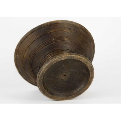 64 - A Middle Eastern treen comport, 19th century. Height 14.5cm, diameter 26cm.