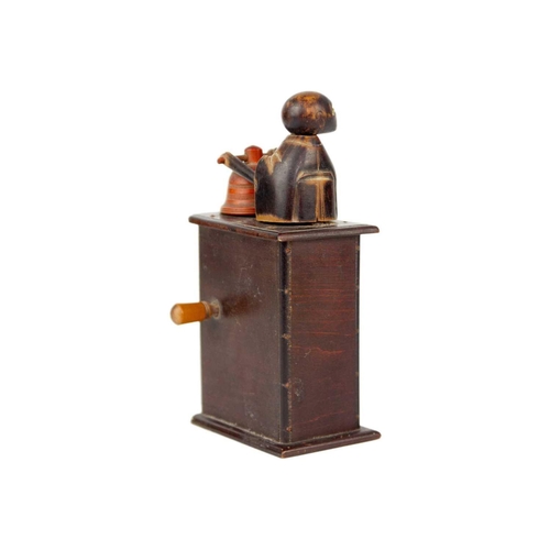 66 - A Japanese wooden mechanical cigarette dispenser, circa 1900. Possibly Ainu Island, height 16cm, wid... 