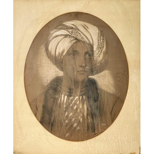 67 - A charcoal portrait of a arabian boy, 19th century. Frame 72 x 57cm.