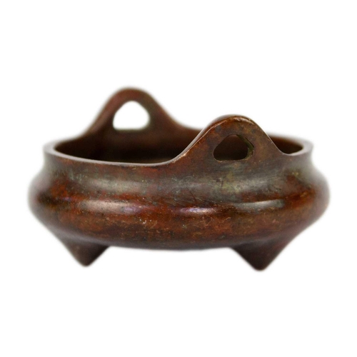 8 - A Chinese bronze censer. With seal mark, height 4.5cm, width 9cm and a Chinese brass pipe, length 32... 