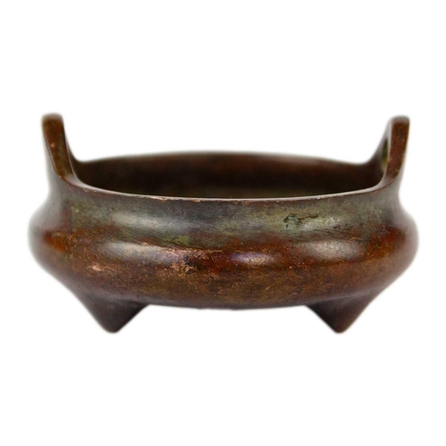 8 - A Chinese bronze censer. With seal mark, height 4.5cm, width 9cm and a Chinese brass pipe, length 32... 