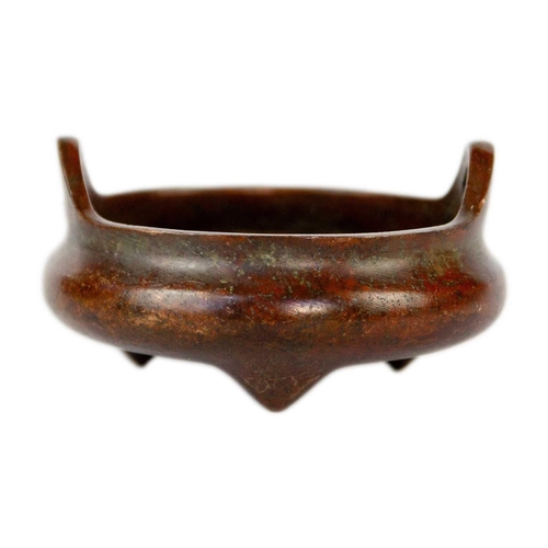 8 - A Chinese bronze censer. With seal mark, height 4.5cm, width 9cm and a Chinese brass pipe, length 32... 